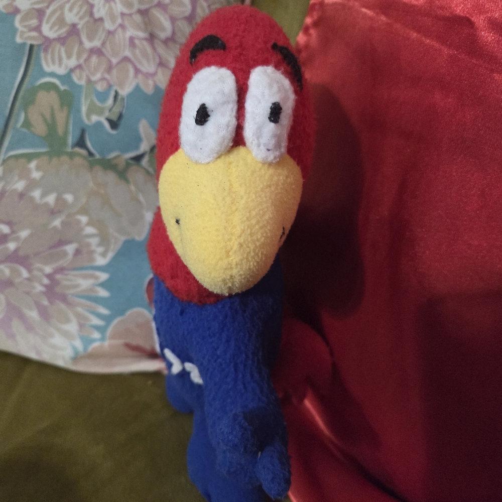 Not Rated Vibrant Parrot Bird Toy - Red, Yellow, Blue